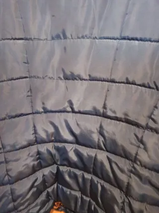 Cazadora invierno azul, con cuello de pelito.