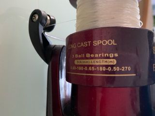 Caña de pescar con carrete