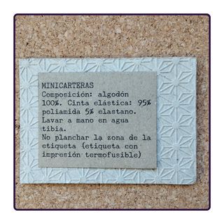 Minicartera con goma elástica