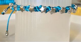 Pulsera artesanal estrellas azul