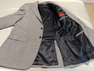 Americana Carolina Herrera gris con coderas