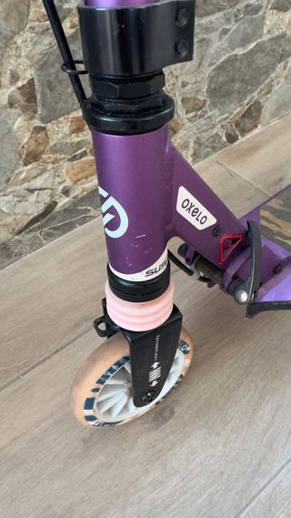 Patinete Oxelo MID 5 rosa en perfecto estado