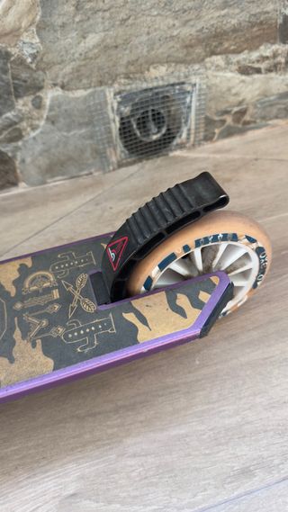 Patinete Oxelo MID 5 rosa en perfecto estado