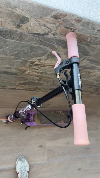 Patinete Oxelo MID 5 rosa en perfecto estado