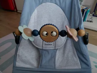 Hamaca Babybjörn + funda impermeable + juguete