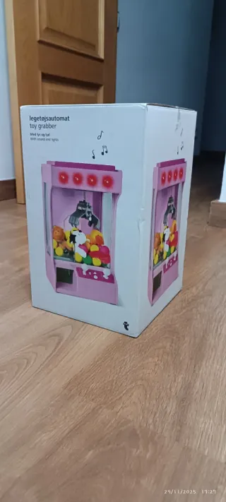 Máquina de garra de juguetes rosa