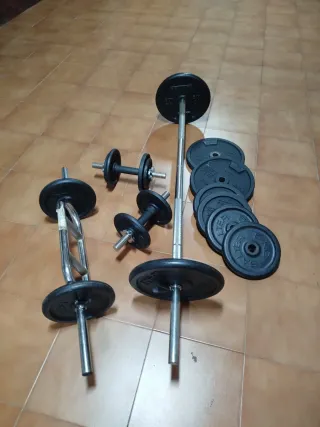 Discos, barras y mancuernas de gimnasio