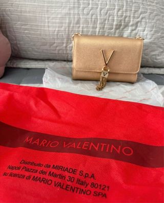 Bolso Clutch Mario Valentino Dorado