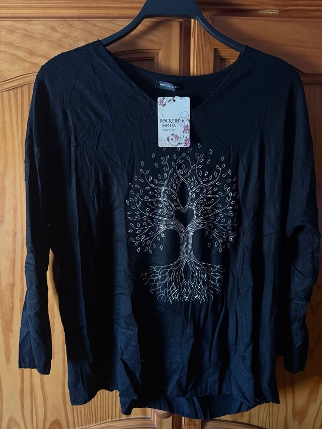 Suéter negro con brillantes