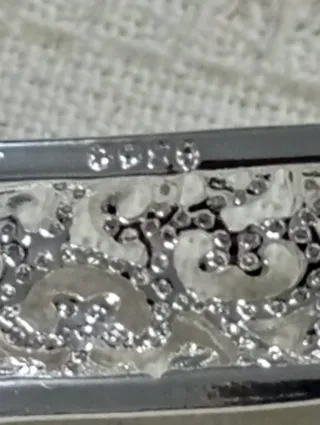 Brazalete de plata con diseño calado