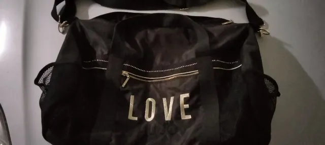 Borsone Lui Jo nero con scritta LOVE