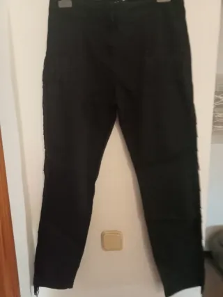 Vaqueros negros Tex con flecos Talla L