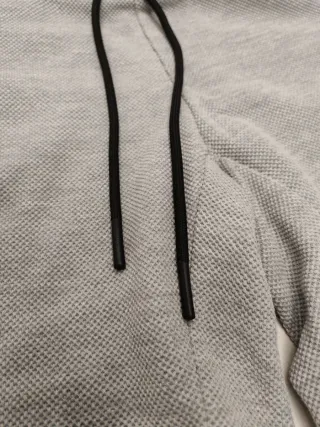 Pantalón corto gris con cremalleras