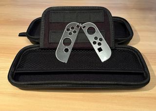 Funda Nintendo Switch y protectores Joysticks