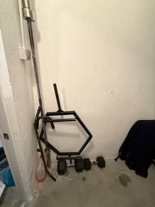 Barra e pesi per palestra