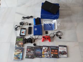 Consola PlayStation 2 con juegos y accesorios