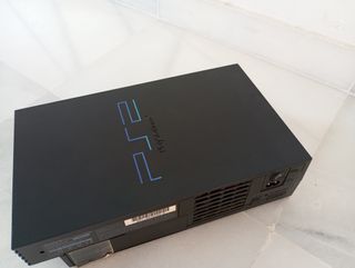 Consola PlayStation 2 con juegos y accesorios