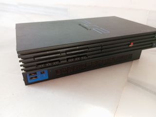 Consola PlayStation 2 con juegos y accesorios