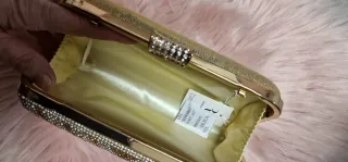 Bolso de fiesta dorado y plateado