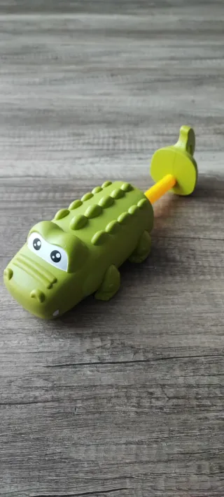 Pistola de agua infantil cocodrilo