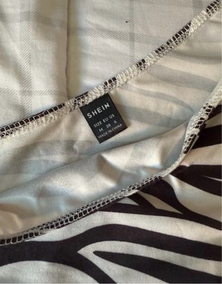 Top asimétrico estampado cebra