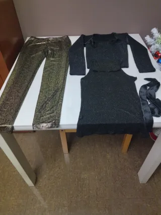 Traje de fiesta negro y dorado