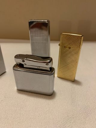 4 accendini da collezione in metallo