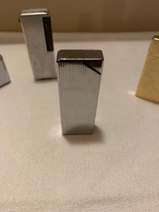 4 accendini da collezione in metallo