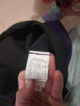 Neopreno infantil morado y rosa decathlon.