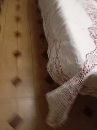 Mantelería artesanal bordada y encaje de burano