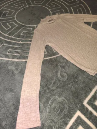 Camiseta de mujer beige de cuello alto