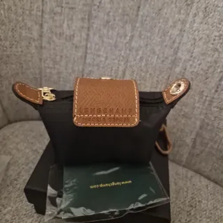 Monedero Longchamp negro y marrón