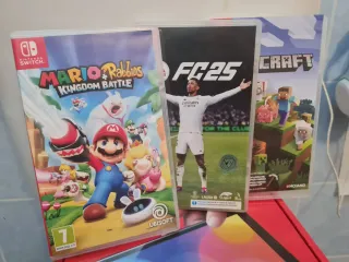 Nintendo Switch OLED + 3 Giochi + custodia leggermente usata