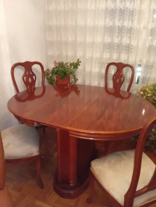 Mesa de comedor redonda extensible de madera