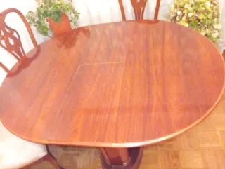 Mesa de comedor redonda extensible de madera