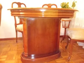 Mesa de comedor redonda extensible de madera