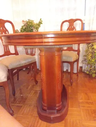 Mesa de comedor redonda extensible de madera