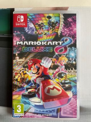 Nintendo Switch + Mario Kart 8 Deluxe + extras