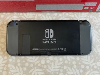 Nintendo Switch + Mario Kart 8 Deluxe + extras