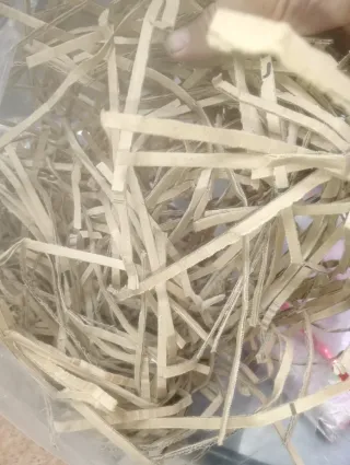 Relleno de cartón triturado para embalaje