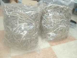 Relleno de cartón triturado para embalaje