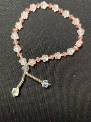 Pulsera de flores rosa y blanca