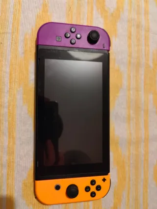 Nintendo Switch Azul/Rojo + Accesorios + juego