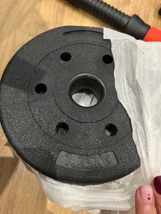 Mancuerna 2 en 1. Barra extensible y discos