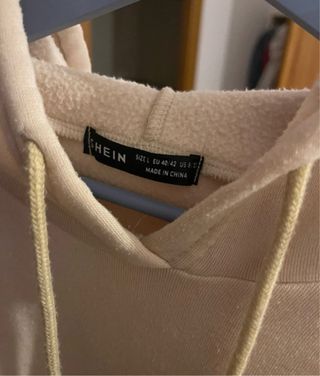 Sudadera beige con capucha