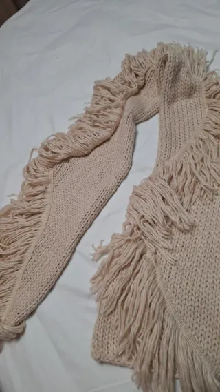 Bufanda beige con flecos