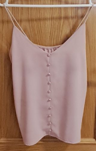 Blusa rosa con botones