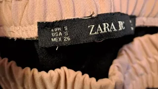 Pantaloni neri con bande laterali