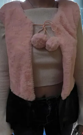 Chaleco pelo rosa con bajo cuero