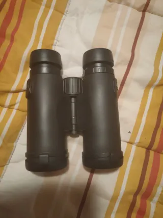 Prismáticos Bushnell con correa